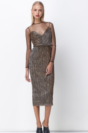 The gold dust mesh panel midi dress purchased by Fairfax Media is yet to arrive. It was bought online on May 24. 