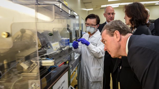 Industry minister Christopher Pyne visits  Trajan Scientific and Medical as the government faces pressure to support the car industry. 