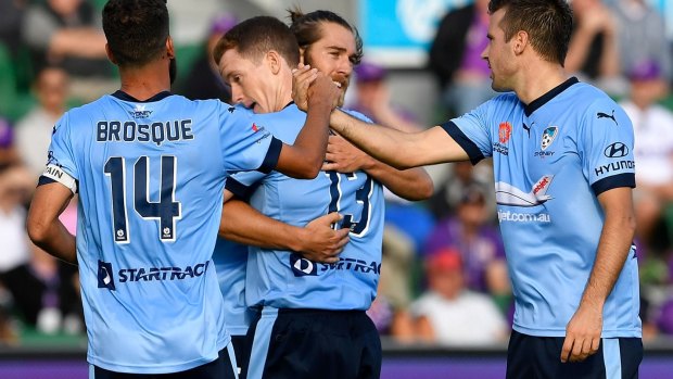 Flying High: Sydney FC smash Perth Glory in their first outing since securing the Premiers' plate.