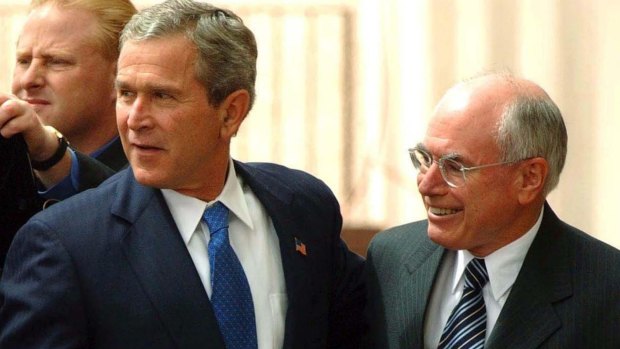 Then-US President George W. Bush  and John Howard outside Parliament House in October 2003.