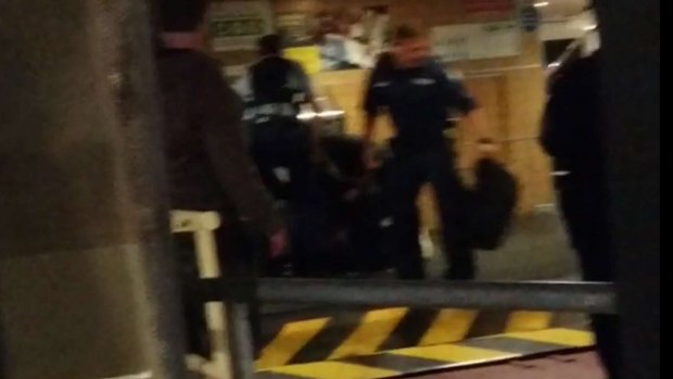 Police seize the man's bag on board the Manly ferry at Circular Quay