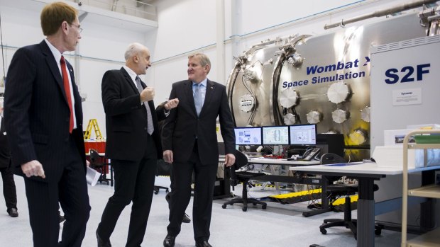 ANU Vice-Chancellor Professor Ian Young, Director of the Research School of Astronomy Professor Matthew Colless, and Minister for Industry Ian Macfarlane at the unveiling of the space engineering facility at the ANU at Mount Stromlo.