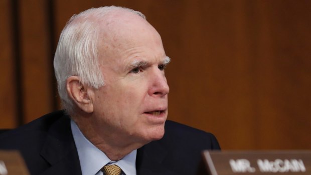 Republican senator John McCain questions former FBI director James Comey during a Senate Intelligence Committee hearing on Capitol Hill.