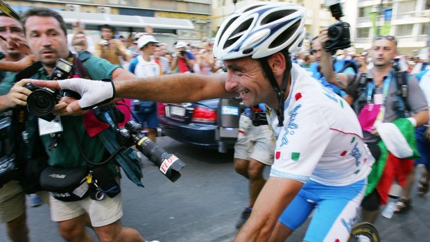 Champion rider: Italy's Paolo Bettini following his gold medal win in the men's road race at the Athen Olympics