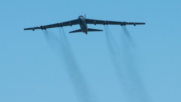Vietnam era USAF B-52 Bombers fly over Canberra to commemorate the 50th anniversary of the Battle of Long Tan.