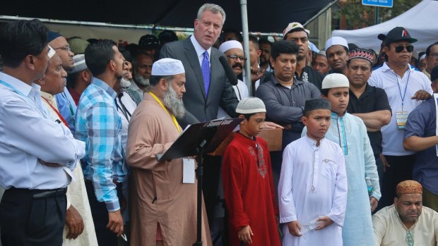 Mayor Bill de Blasio, center, speaks during funeral services for Imam Maulama Akonjee and Thara Uddin.