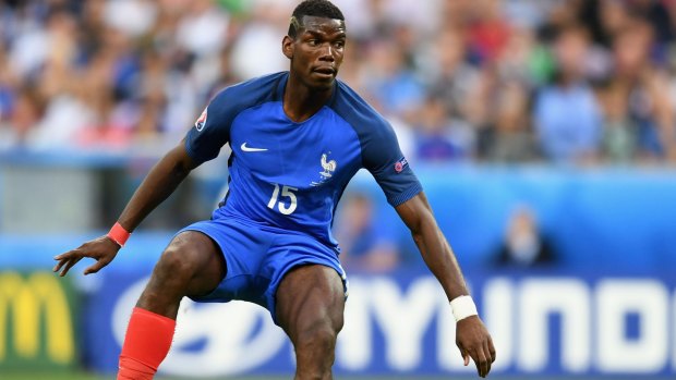 Strength and poise: Paul Pogba in action for France in the Euro 2016 final.