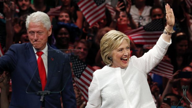 Former President Bill Clinton, left, with his wife, Democratic presidential hopeful Hillary Clinton.