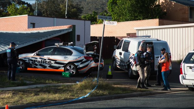 A car port collapsed and a police car was rammed at a home in Kambah.