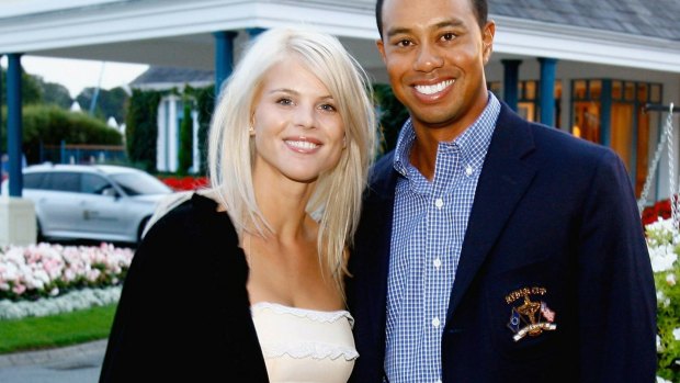 Tiger Woods poses with Elin Nordegren after the first official practice day of the 2006 Ryder Cup in Ireland. 