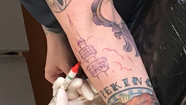 Grant Heino's Telstra Tower tattoo took 90 minutes in the chair.