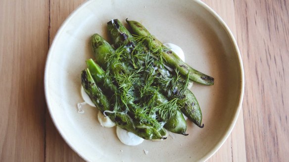 Broad beans, globe artichoke, goat's cheese and dill at Montalto restaurant.