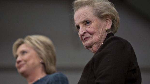 Former US secretary of state Madeleine Albright, right, has urged women to give Hillary Clinton their votes.