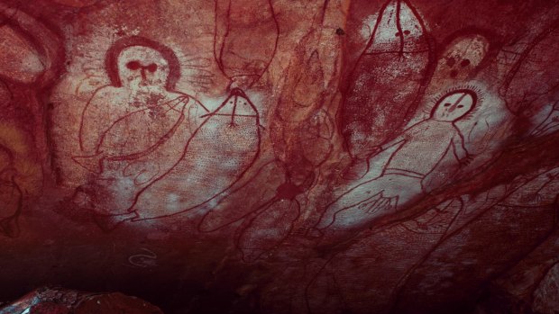 Ancient aboriginal Wandjina rock art in cave, Bigge Island, Western Australia.