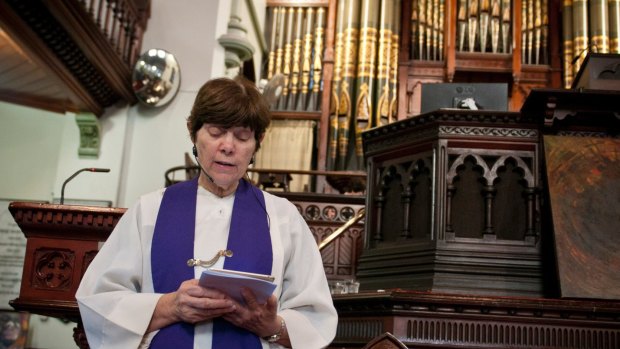 Reverend Lyn Burden taking the Easter service at Albert Street Uniting Church.
