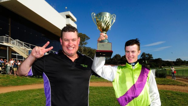 Hometown victory:  Joe Cleary and jockey John Kissick with the Queanbeyan Cup won by Hudson County.