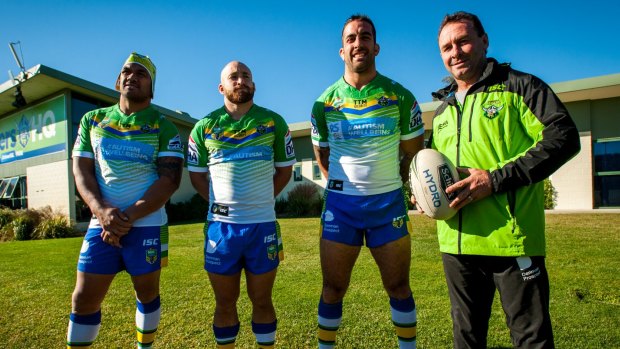 Canberra Raiders players Jeff Lima, Kurt Baptiste and Paul Vaughan show off the special Ricky Stuart Foundation jerseys they will wear against Canterbury on Sunday to help raise money and awareness for autism.