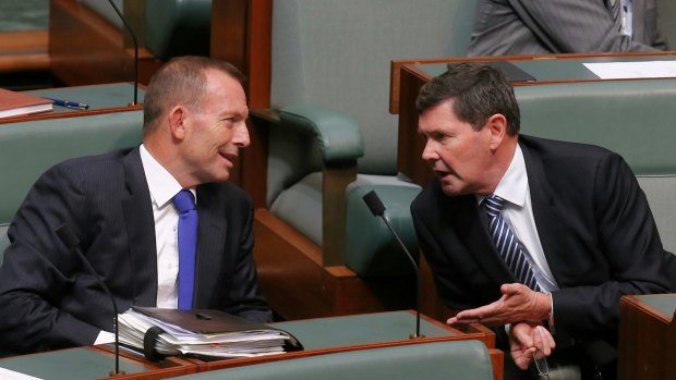 Backbenchers Tony Abbott and Kevin Andrews during question time last year.