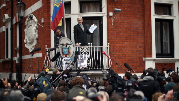 Assange speaks from the balcony of the Ecuadorian embassy in February.