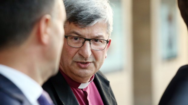 Bishop Roger Herft leaving Newcastle Court House after a session of the Royal Commission into Institutional Responses to Child Sexual Abuse.