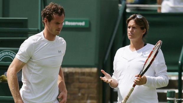 Work out: Andy Murray with Amelie Mauresmo during a practice session.
