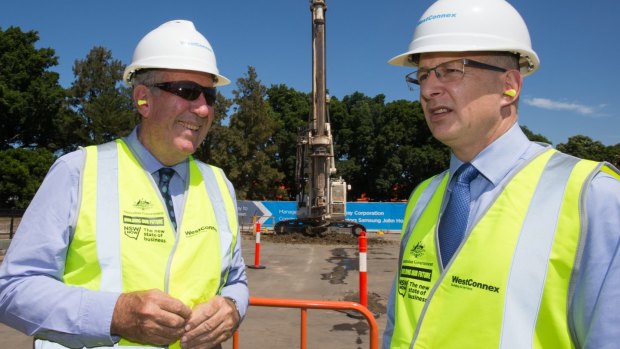 Federal Minister for Major Projects Paul Fletcher, right, said the government was already looking at a system of road pricing for heavy vehicles.