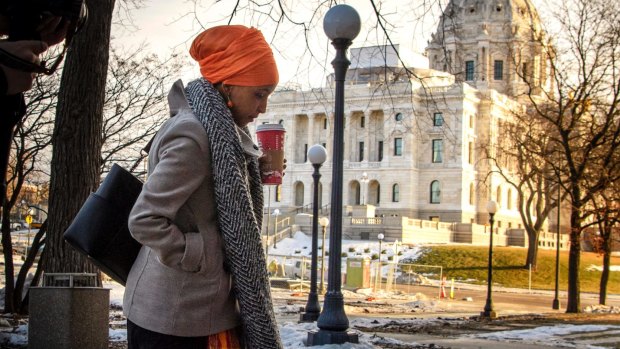 Ilhan Omar arrives at the Minnesota State Capitol for the first day of the legislative session.