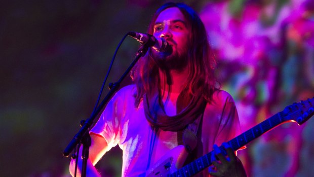 Kevin Parker from Australian band Tame Impala on stage. 