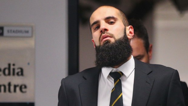 Richmond's Bachar Houli leaves the AFL tribunal after receiving a two-week suspension for striking Jed Lamb.
