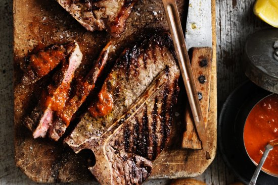 T-bone steak with barbecue sauce by Neil Perry. Images by William Meppem, please credit.