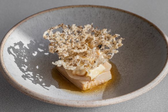 Go-to dish: Smoked pig jowl, fan shell razor clams, shiitake, sea cucumber crackling.