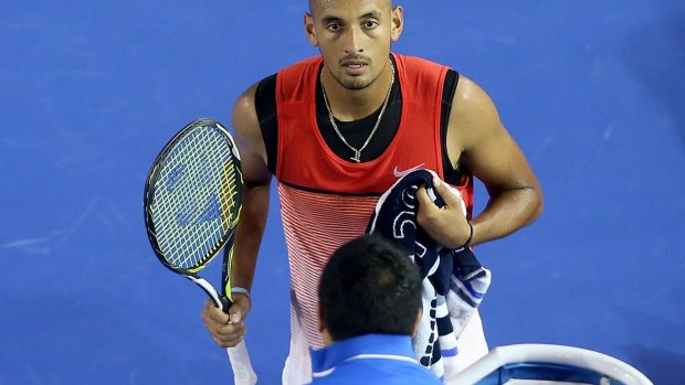 Time for a reality check:  Nick Kyrgios argues with the chair umpire during his third round match on Friday night.