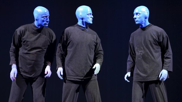 Blue Man Group performing at the Lyric Theatre in Sydney.