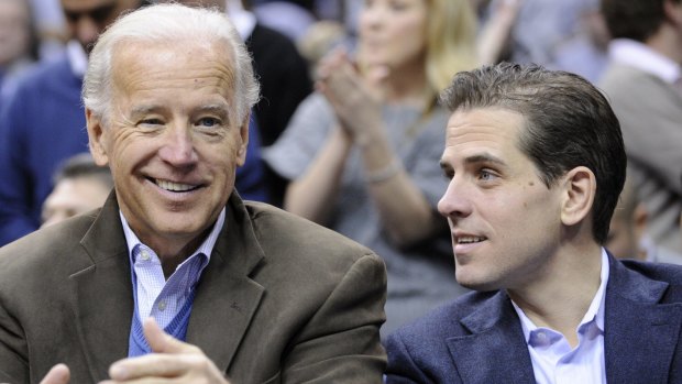 Former US Vice-President Joe Biden with his son Hunter at a basketball match in 2010.