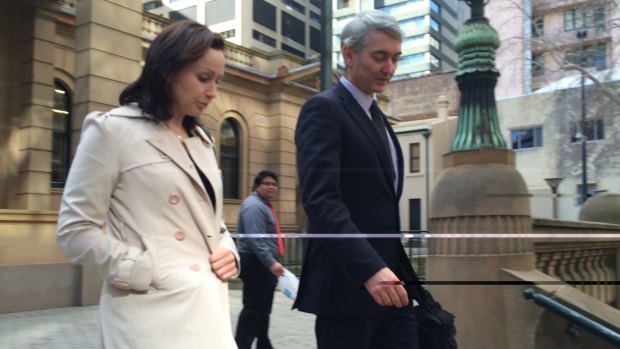 Benjamin Hampton's wife Louise and lawyer Gordon Elliot leave court after the bail hearing.
