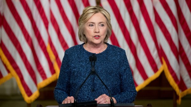 Democratic presidential candidate Hillary Clinton gives a statement to members of the media after attending a National Security working session at the Historical Society Library.