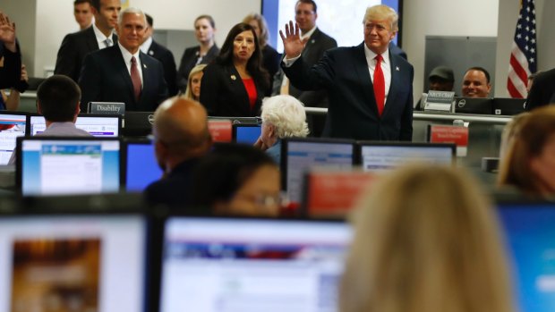 President Donald Trump tours Federal Emergency Management Agency (FEMA) headquarters in Washington on  August 4.
