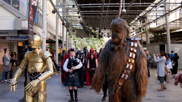 Chewbacca and C-3PO led the intergalactic reinforcements for part of the parade.