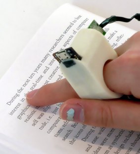 MIT's prototype for a device to help blind people read non-brail texts.