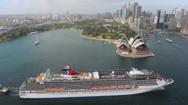 Sizeable visitor: Carnival Spirit, from the world's largest cruise line is too big to get under the Sydney Harbour Bridge and if tipped on her stern, the 292.6 metre long ship would stretch more than 42 metres above the observation deck of Sydney Tower.
