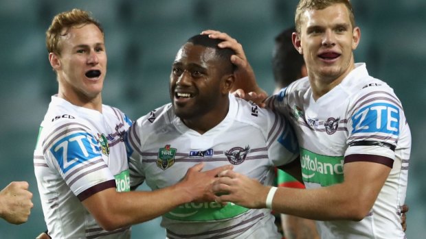 Oh, what a (former) Knight: Daly Cherry-Evans and Tom Trbojevic congratulate Akuila Uate.