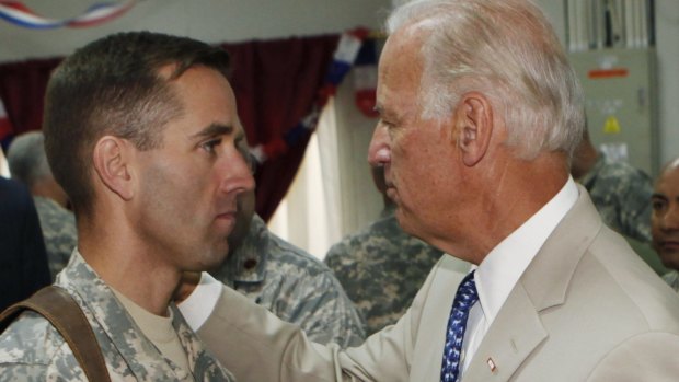 US Vice President Joe Biden, right, talks with his son, US Army Captain Beau Biden, in 2009. 