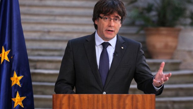 Catalan President Carles Puigdemont has called on Catalans to peacefully oppose Spain's takeover, in a staged appearance that seemed to convey that he refuses to accept his firing, which was ordered by central authorities.