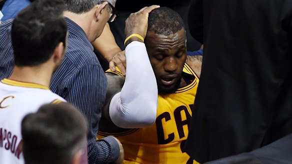 LeBron James splits head open after clash with Andrew Bogut
