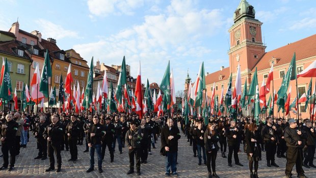 A far-right group, the National-Radical Camp, march in Warsaw. Poland's government is facing pressure to deal with the phenomenon of a rising far-right.