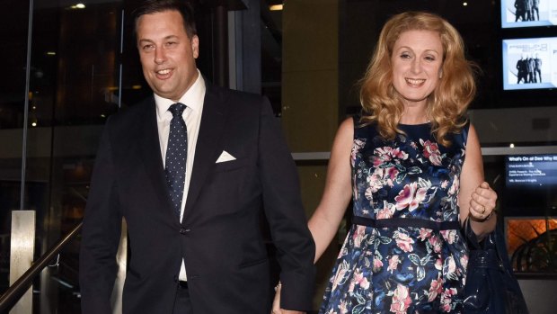 Jason Falinski leaves Dee Why RSL with his wife after defeating Bronwyn Bishop in the Liberal pre-selection ballot for the seat of Mackellar.