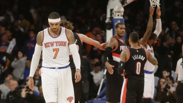 Misery: Knicks star Carmelo Anthony  during the loss to Portland.