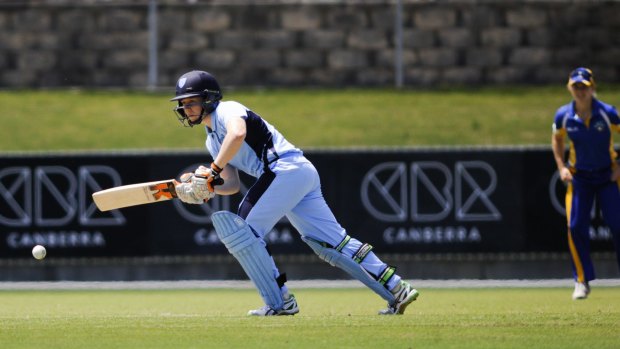 Tough cookie: Alyssa Healy made 65 not out for NSW after being hit on the head.