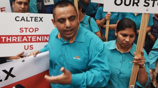 Sanjeev Sharma at the protest at Caltex head office in Sydney.