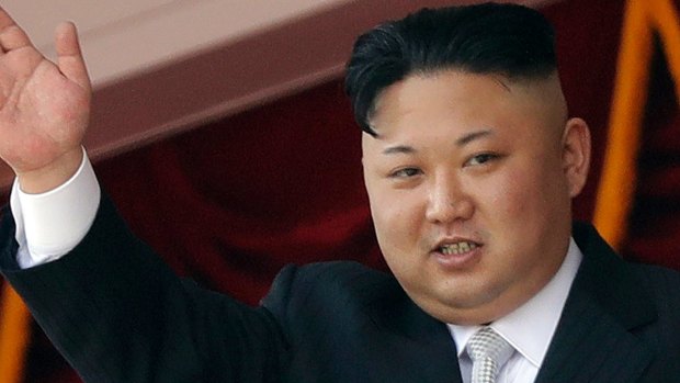 North Korean leader Kim Jong-un waves during a military parade in Pyongyang, North Korea. 